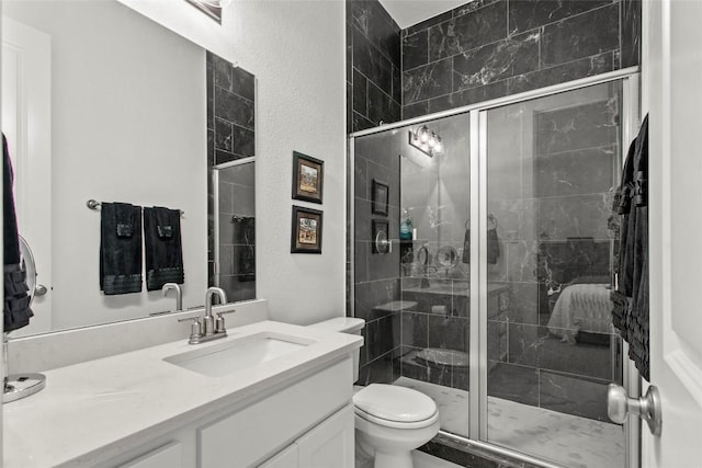 116 Egret Ln, Austin, TX 78737 - bathroom with vanity, toilet, and a shower stall