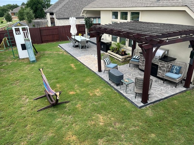 157 Monroe Dr, Kyle, TX 78640 - view of yard featuring a pergola, a playground, and a patio
