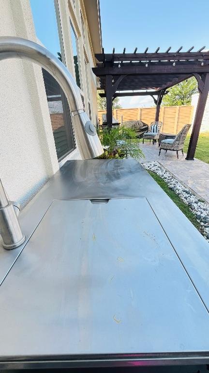 157 Monroe Dr, Kyle, TX 78640 - view of patio featuring a pergola