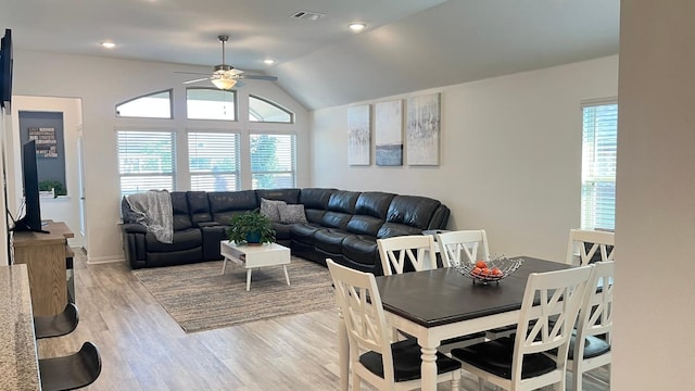157 Monroe Dr, Kyle, TX 78640 - living area with ceiling fan, light wood finished floors, and vaulted ceiling