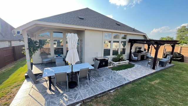 157 Monroe Dr, Kyle, TX 78640 - back of house with stucco siding, a pergola, a patio area, and a shingled roof