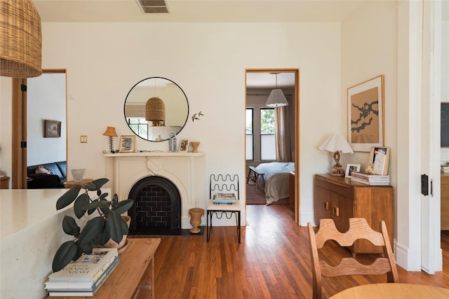 8608 Georgian Dr, Austin, TX 78753 - living area featuring wood finished floors and a fireplace
