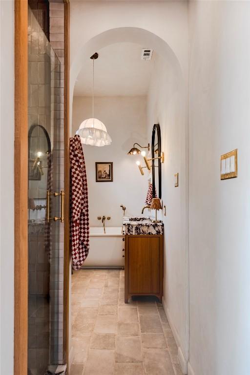 8608 Georgian Dr, Austin, TX 78753 - hall with arched walkways