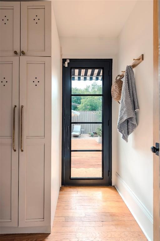 8608 Georgian Dr, Austin, TX 78753 - doorway to outside with light wood finished floors