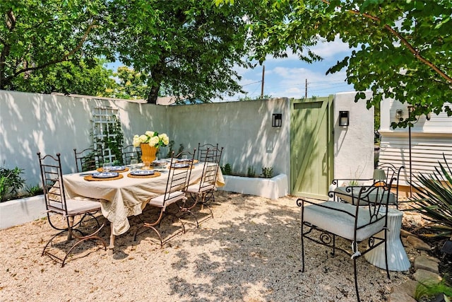 8608 Georgian Dr, Austin, TX 78753 - view of patio featuring outdoor dining space