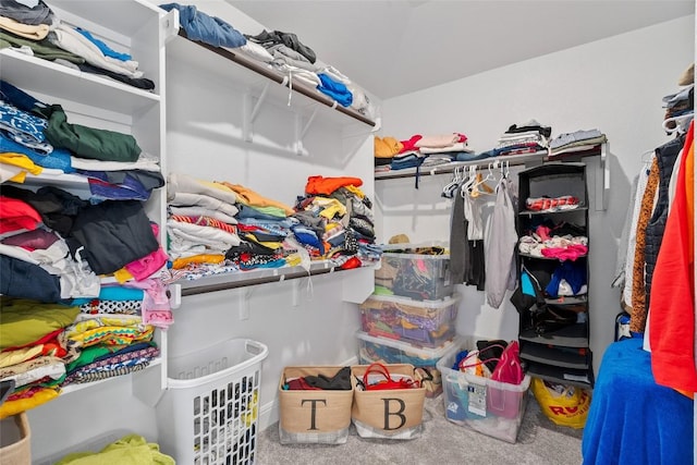 1305 Crescent Ln, Georgetown, TX 78633 - walk in closet featuring carpet flooring