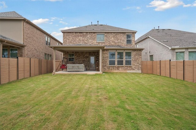1305 Crescent Ln, Georgetown, TX 78633 - rear view of house featuring a patio area, a fenced backyard, and brick siding