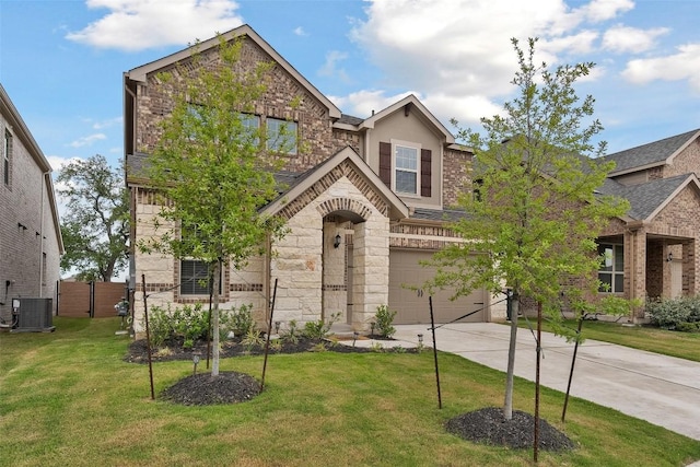 1305 Crescent Ln, Georgetown, TX 78633 - view of front facade with stone siding, driveway, central air condition unit, an attached garage, and a front lawn