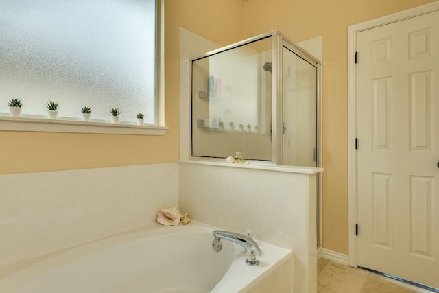 745 Bent Wood Pl, Round Rock, TX 78665 - bathroom with a stall shower and a garden tub