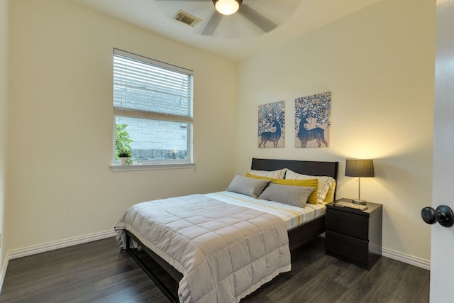 745 Bent Wood Pl, Round Rock, TX 78665 - bedroom featuring dark wood-style floors, baseboards, and a ceiling fan