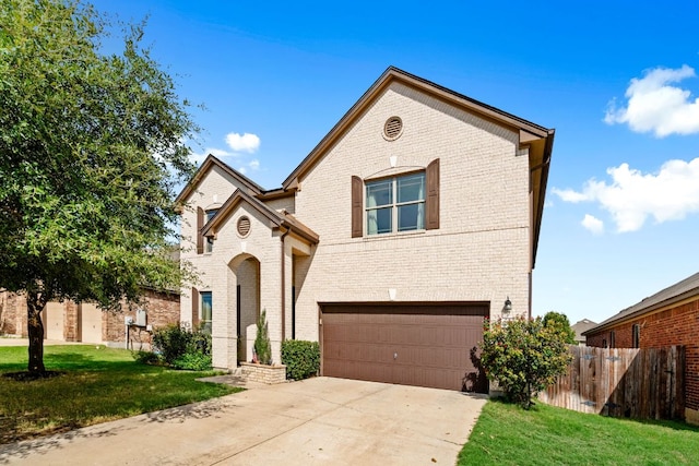 122 Mancos Dr, Georgetown, TX 78626 - view of front of home with brick siding, a garage, and concrete driveway