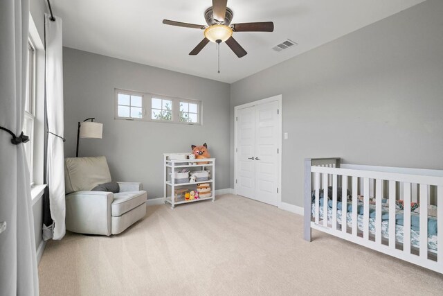 13420 Trail Driver St, Austin, TX 78737 - carpeted bedroom with a nursery area and ceiling fan