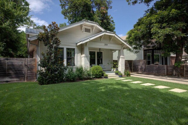 2504 Willow St Unit A, Austin, TX 78702 - craftsman house with covered porch and a front lawn