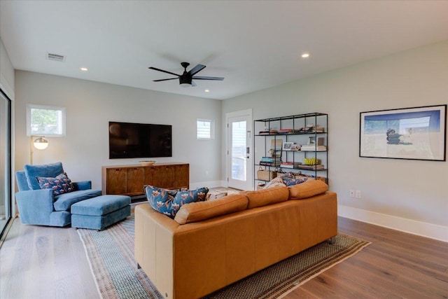2504 Willow St Unit A, Austin, TX 78702 - living area with wood finished floors, baseboards, recessed lighting, and ceiling fan