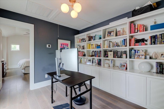 2504 Willow St Unit A, Austin, TX 78702 - office featuring wood finished floors, attic access, and baseboards