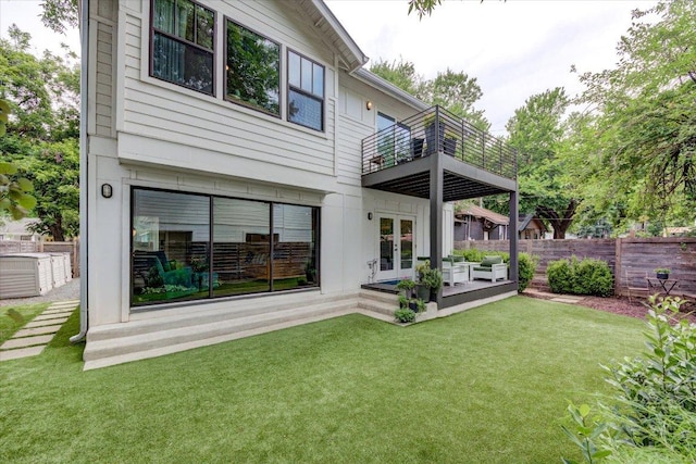 2504 Willow St Unit A, Austin, TX 78702 - back of house with french doors and a balcony