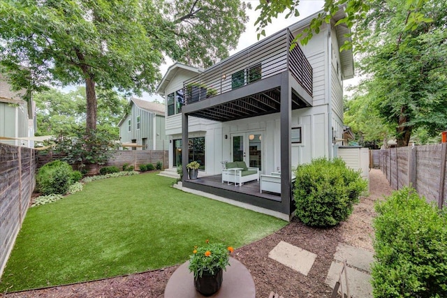 2504 Willow St Unit A, Austin, TX 78702 - back of property featuring french doors, board and batten siding, and a balcony