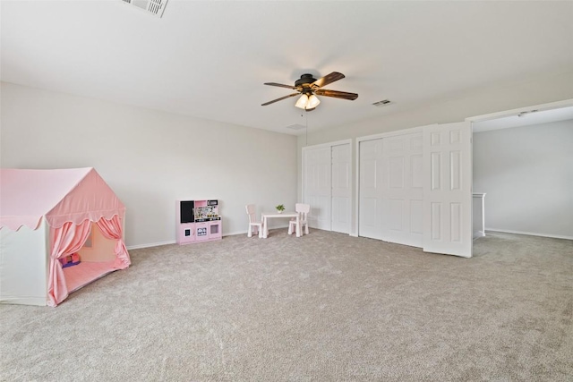 223 Woodlake Dr, Georgetown, TX 78633 - recreation room with ceiling fan, carpet flooring, and baseboards