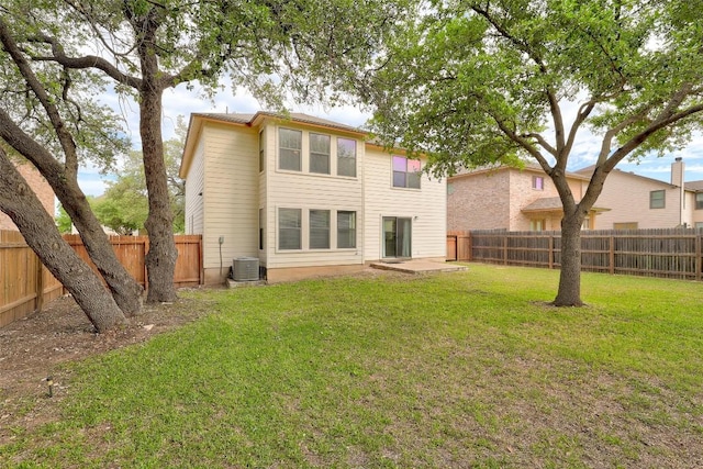 223 Woodlake Dr, Georgetown, TX 78633 - rear view of house with central AC