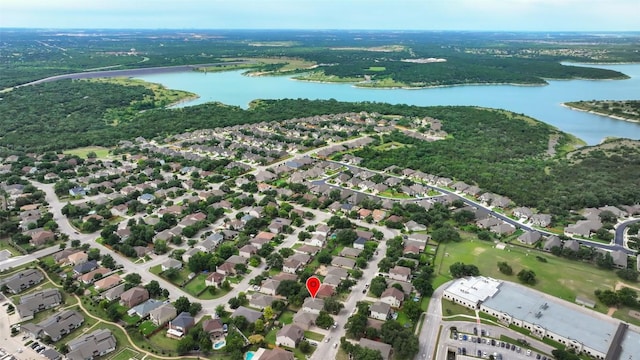 223 Woodlake Dr, Georgetown, TX 78633 - aerial overview of property's location with a large body of water and nearby suburban area