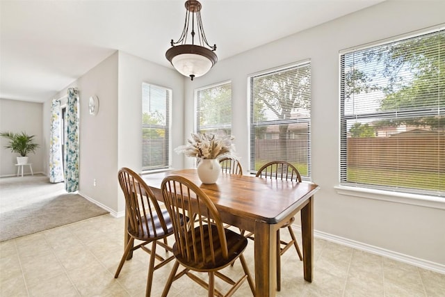 223 Woodlake Dr, Georgetown, TX 78633 - dining area with baseboards and light colored carpet