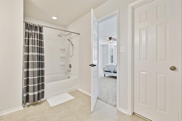 223 Woodlake Dr, Georgetown, TX 78633 - ensuite bathroom featuring shower / bath combo with shower curtain, baseboards, and a ceiling fan
