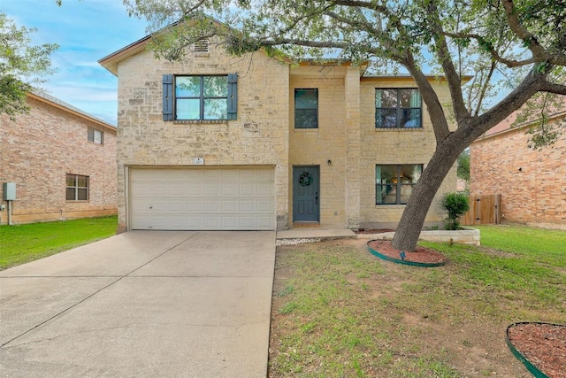 223 Woodlake Dr, Georgetown, TX 78633 - view of front facade with a garage, stone siding, and driveway