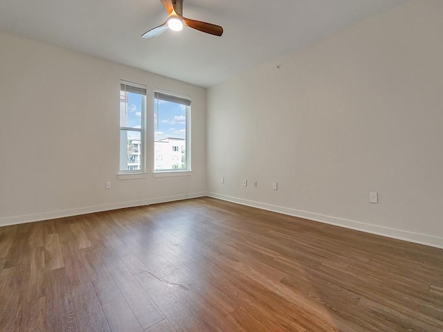 1900 Barton Springs Rd Unit 4013, Austin, TX 78704 - unfurnished room featuring ceiling fan, dark wood finished floors, and baseboards
