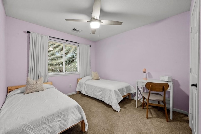 5929 Mesa Verde Cir, Austin, TX 78749 - bedroom with carpet floors, baseboards, and ceiling fan