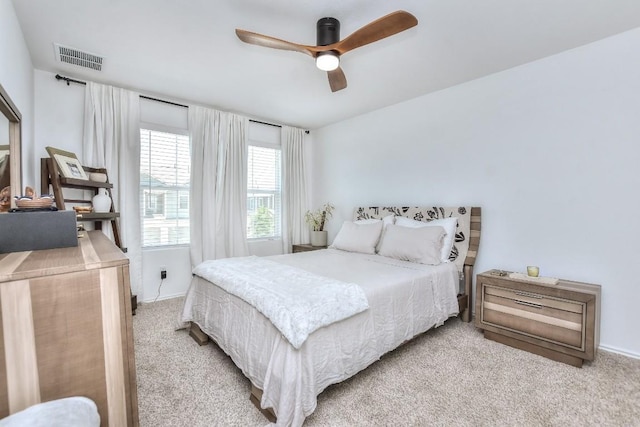 159 Andross Ln, Bastrop, TX 78602 - bedroom with carpet floors, ceiling fan, and baseboards