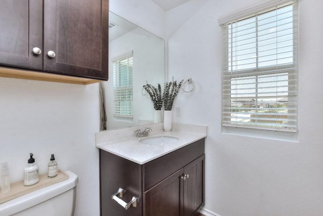 159 Andross Ln, Bastrop, TX 78602 - half bathroom featuring toilet and vanity