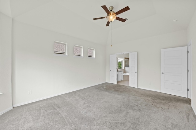 6724 Leonardo Dr, Round Rock, TX 78665 - unfurnished bedroom with carpet floors, connected bathroom, baseboards, and a high ceiling