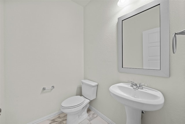 6724 Leonardo Dr, Round Rock, TX 78665 - half bathroom with baseboards and toilet