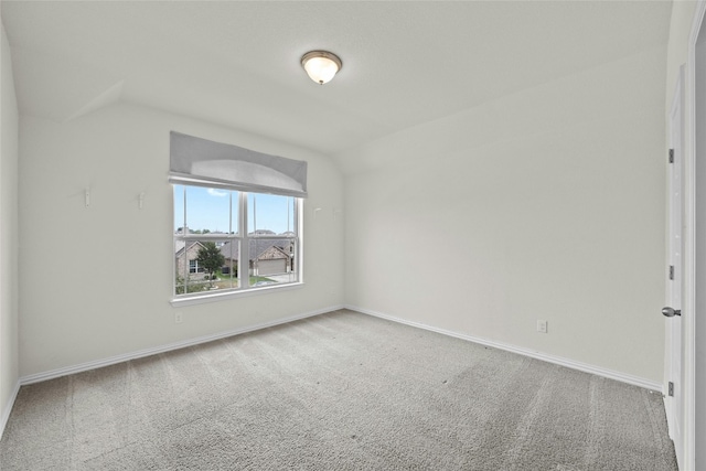 6724 Leonardo Dr, Round Rock, TX 78665 - additional living space with vaulted ceiling, carpet floors, and baseboards
