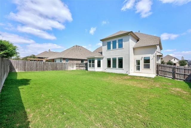 6724 Leonardo Dr, Round Rock, TX 78665 - rear view of house featuring a patio and a shingled roof