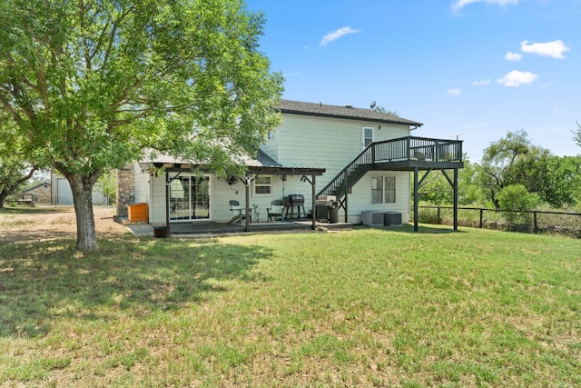 744 Jim Bowie Dr, Spicewood, TX 78669 - back of property with a deck, a patio, central air condition unit, and stairs