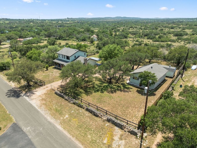 744 Jim Bowie Dr, Spicewood, TX 78669 - view of subject property with a heavily wooded area