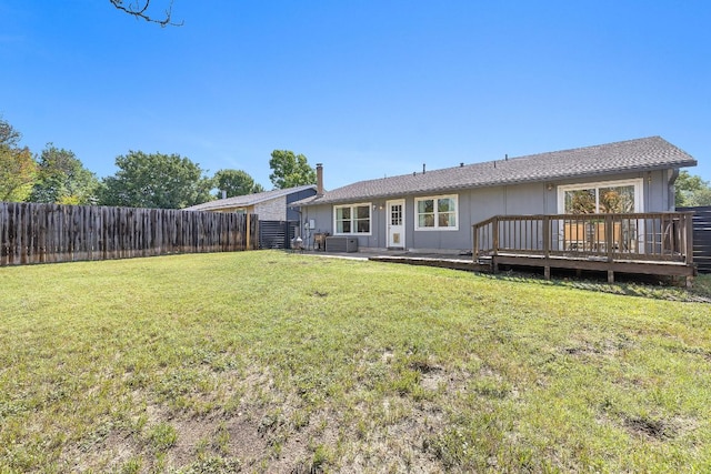 11200 Bending Bough Trl, Austin, TX 78758 - back of property featuring a deck and central AC unit
