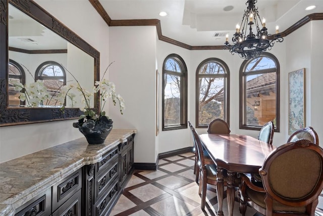 604 Logans Ln, Austin, TX 78746 - dining room featuring inlaid floor details, a chandelier, crown molding, recessed lighting, and a raised ceiling