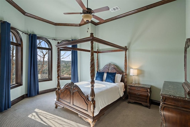 604 Logans Ln, Austin, TX 78746 - carpeted bedroom with ornamental molding and ceiling fan