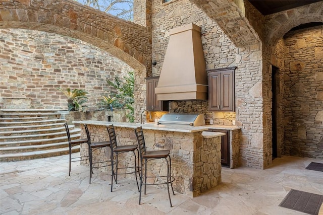 604 Logans Ln, Austin, TX 78746 - view of patio / terrace with exterior kitchen