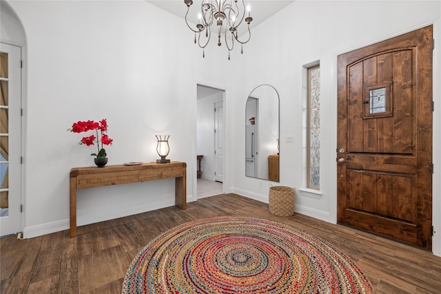 310 Lauren Trl, Cedar Park, TX 78613 - entryway with wood finished floors, a chandelier, a high ceiling, and baseboards