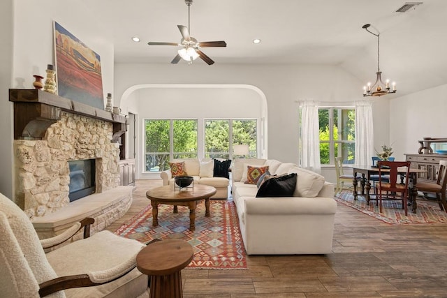 310 Lauren Trl, Cedar Park, TX 78613 - living room featuring plenty of natural light, wood finished floors, a ceiling fan, a chandelier, and recessed lighting