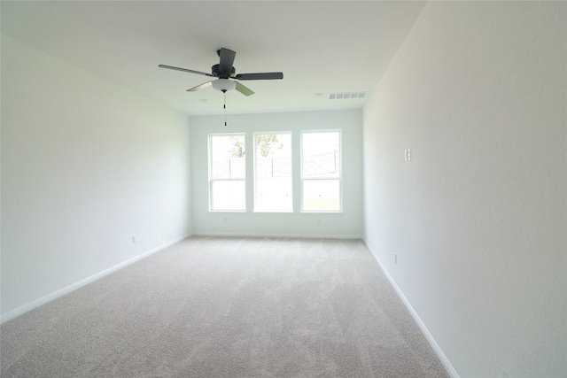 5337 Olimpico Way, Leander, TX 78641 - unfurnished room featuring light carpet, a ceiling fan, and baseboards