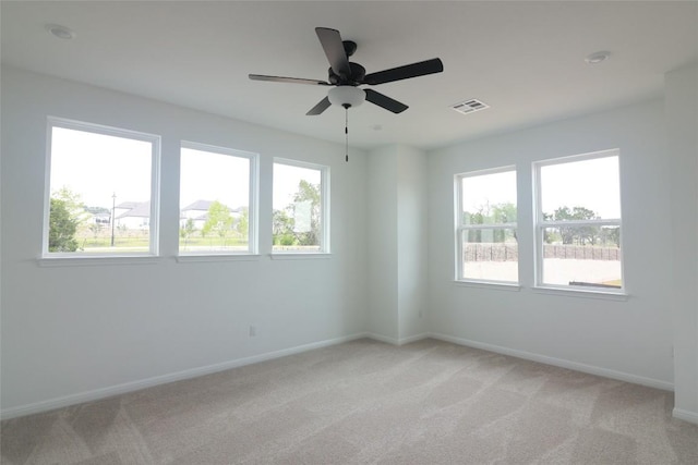 5337 Olimpico Way, Leander, TX 78641 - spare room featuring plenty of natural light, light carpet, and baseboards