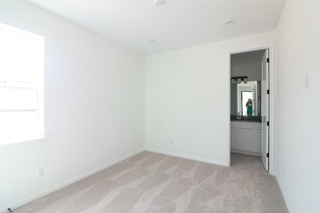 5337 Olimpico Way, Leander, TX 78641 - spare room with light colored carpet and baseboards