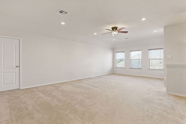 113 Blossom Valley Strm, Buda, TX 78610 - unfurnished room with light carpet, ceiling fan, recessed lighting, and baseboards