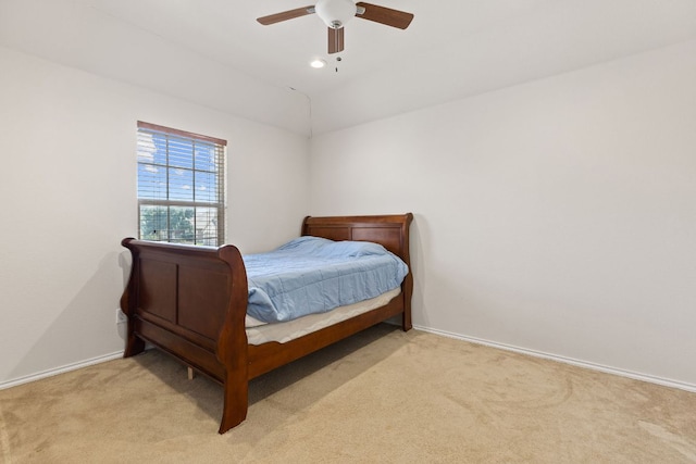 113 Blossom Valley Strm, Buda, TX 78610 - bedroom with light colored carpet, baseboards, ceiling fan, lofted ceiling, and recessed lighting
