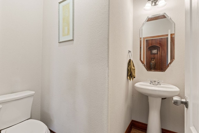 113 Blossom Valley Strm, Buda, TX 78610 - half bathroom featuring toilet
