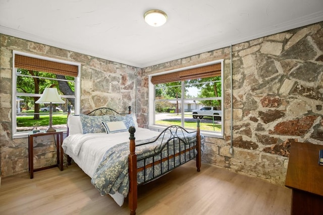 1507 Ash St, Georgetown, TX 78626 - bedroom with ornamental molding and wood finished floors